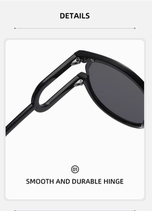 Detail view of smooth and durable black plastic and metal hinge on round sunglasses