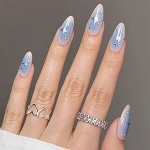 Blue and pink gradient almond press-on nails with silver stars and metallic rivets