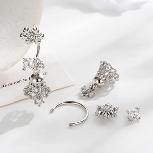 Silver snowflake navel ring set with sparkling zircons and delicate tassel pendants
