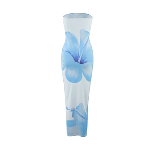Detail view of white strapless maxi dress with blue floral print for summer resort style
