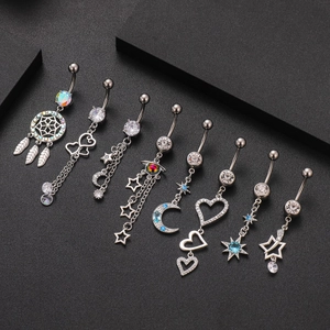Set of 7 stainless steel belly rings with zircon stones in star and moon designs