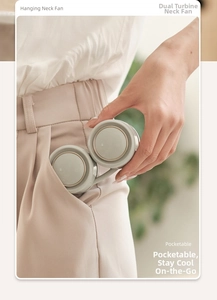 Detail showing the portable hanging neck fan being easily placed into a pocket