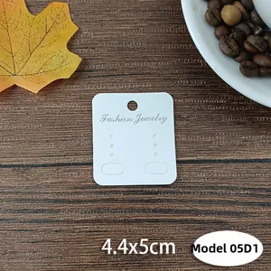 Detailed view of 4.4x5cm white jewelry cards with silver Fashion Jewelry text