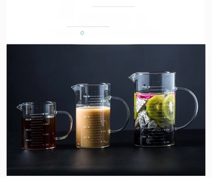 Three heat-resistant glass measuring cups in 350ml 500ml 1000ml sizes with handles