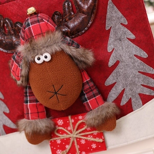 Christmas felt gift bag featuring a 3D plush reindeer and festive snowflake patterns