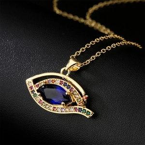 Luxury gold necklace with evil eye pendant featuring blue and multicolored zircons