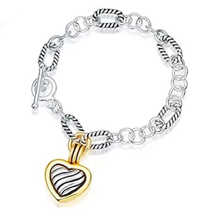 Classic stainless steel cable chain bracelet with two-tone striped heart pendant charm