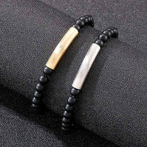Minimalist black matte onyx beaded bracelet with brushed stainless steel curved tube