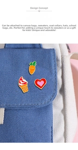 Detailed view of carrot, ice cream, and heart enamel pins on a blue canvas bag strap