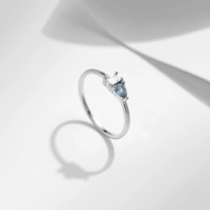 Minimalist 925 sterling silver ring with blue pear and clear rectangular cut crystals