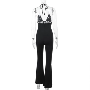 Back view of a sexy black halter neck jumpsuit with backless design and slim fit cut