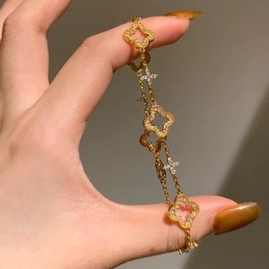 Hollow Flower Bracelet 24K Gold Plated Copper Micro Inlaid Zircon Four Leaf Clover Retro Style For Women