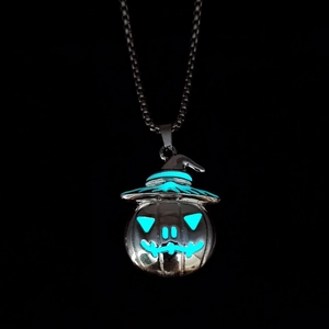 Luminous Halloween pumpkin pendant with wizard hat showing blue glow in the dark effect
