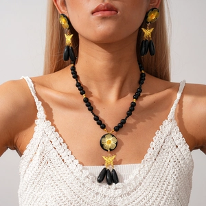 Gothic beaded necklace set with gold flower butterfly pendants and teardrop charms