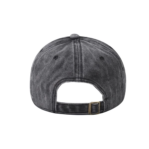 Detail of washed cotton baseball cap featuring vintage bronze metal adjustable buckle