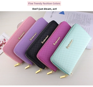 Close-up of long zip-around wallets for women in five pastel colors with cross grain leather