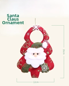 Detail of felt Christmas tree ornament with Santa figure and snowflake patterns