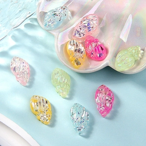 Colorful iridescent resin conch shells with crackle patterns for DIY crafts and jewelry