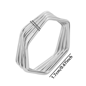 Macro shot of a five-layer hexagonal 304 stainless steel ring with dimension labels