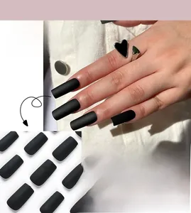 Matte black long square press-on nails shown with heart ring and detailed layout