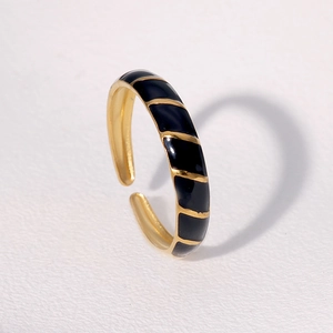 Vintage adjustable gold-plated stainless steel ring with black enamel striped pattern