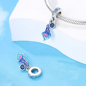 Silver feather bead charm with blue enamel and peacock zircon for charm bracelets