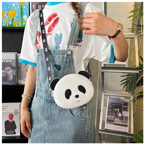 Close-up of cute panda silicone crossbody bag with adjustable patterned strap for kids