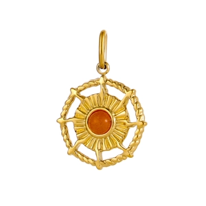 Macro shot of gold stainless steel pendant with orange gemstone and sunburst texture