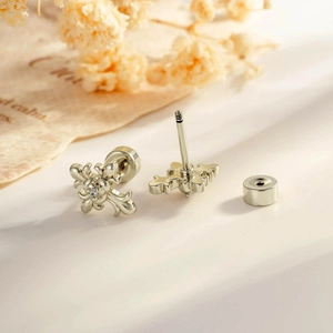 Vintage silver rose cross stud earrings with sparkling zircon inlay and screw-back posts