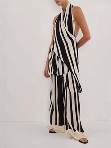 Black and white striped backless halter top and wide leg pants two-piece set
