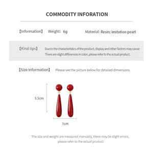 Detailed size chart for red teardrop earrings with dimensions 5.5cm by 1cm and weight