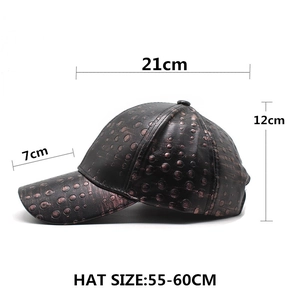 Black PU leather baseball cap with bronze textured dot pattern and sizing dimensions