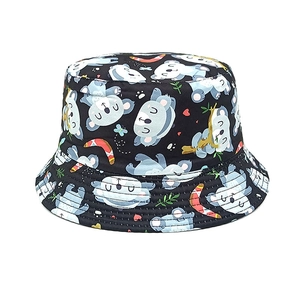 Detail shot of a black kids bucket hat featuring a cute cartoon koala and boomerang print