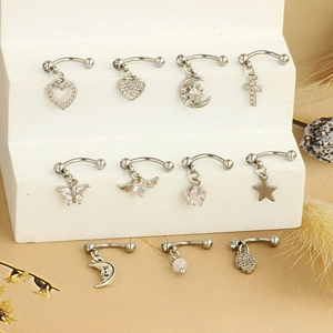 Surgical steel curved barbells with diverse charms like butterfly, moon and heart