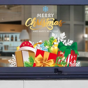 Close-up of Merry Christmas and Happy New Year festive bow and gift box window decals