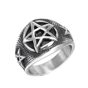 Vintage stainless steel star ring with textured details and a punk aesthetic