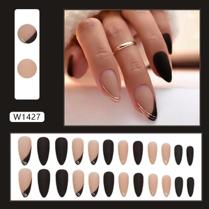 Matte black and nude French almond press-on nails with gold glitter trim for women