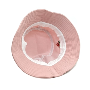 Pink cotton bucket hat with watermelon embroidery and interior sweatband detail
