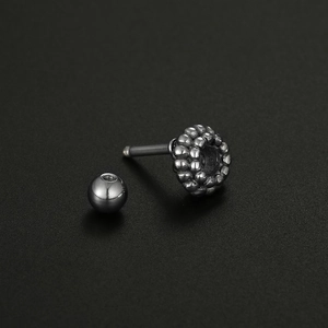 Polished 16G stainless steel skull cartilage earring with screw ball back closure