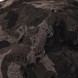 Asymmetrical distressed black octagonal hat for women with vintage ripped fabric details