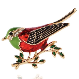 Exquisite bird perched on branch brooch with enamel finish and rhinestone accents