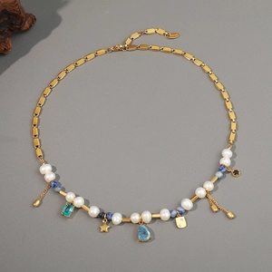 French retro pearl necklace with emerald pendant and gold stainless steel charms