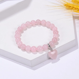 Bracelet en perles de quartz rose naturel avec pendentif cœur et cordon élastique