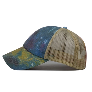 Side view of washed baseball cap featuring artistic print and beige mesh back detail