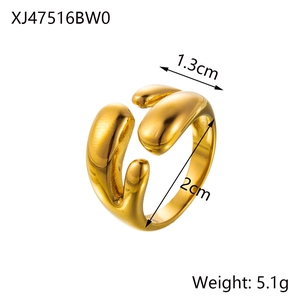 Detailed view of golden bow ring dimensions showing 1.3cm width and 2cm inner diameter