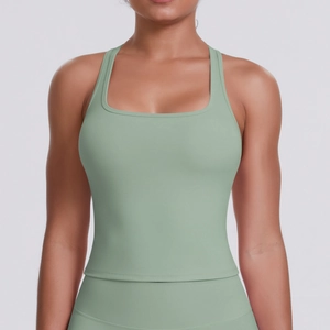 Close-up of sage green athletic tank top featuring high-elastic fabric and square neckline