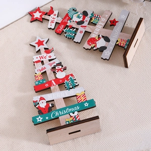 Christmas tree wooden table decor set with Santa, snowman and festive holiday greetings