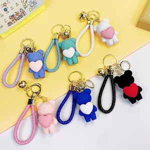 Creative resin heart bear keychain set with woven straps and colorful bells for bags