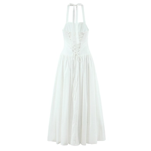 White halter neck maxi dress with corset-style back tie detail on white background