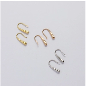 Three teardrop hook earrings in gold, rose gold, and silver with high-polish finish